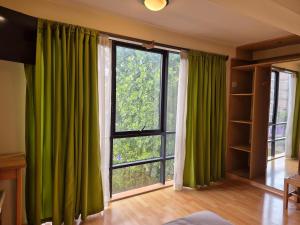 Giường trong phòng chung tại Florida del Inca Hotel