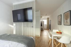 Postel nebo postele na pokoji v ubytování EA-Modernes Studio nähe Hauptplatz