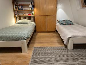 Ένα ή περισσότερα κρεβάτια σε δωμάτιο στο Room for booklovers