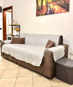 a large bed sitting in a room with at Top Apartment in Beccacivetta +40 photos