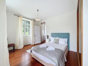 Postel nebo postele na pokoji v ubytování Quinta do Serrado II