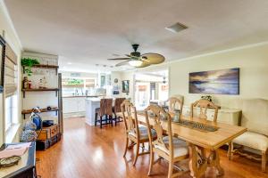 a kitchen and dining room with a table and chairs at Less Than 1 Mi to Boat Ramp Canal-Front Retreat in Astor! in Astor