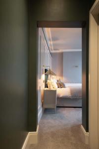 Postel nebo postele na pokoji v ubytování Creighton Hotel + 6 fotografií
