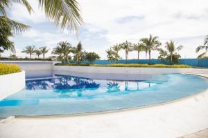 The swimming pool at or close to Studio for Couples with Soft Bed and Beach View