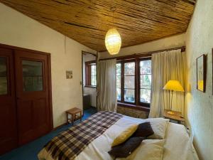 Postel nebo postele na pokoji v ubytování Casa Gabriela, Monte Grande ,Valle de Elqui + 19 fotografií
