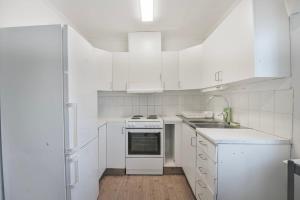 Kuchyň nebo kuchyňský kout v ubytování Central 2 room apartment in Junsele