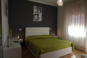 Säng eller sängar i ett rum på Maison Talenti B&B Roma