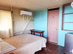 Postel nebo postele na pokoji v ubytování Casa Jade