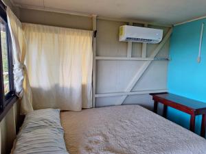 Postel nebo postele na pokoji v ubytování Casa Jade