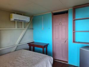 Postel nebo postele na pokoji v ubytování Casa Jade