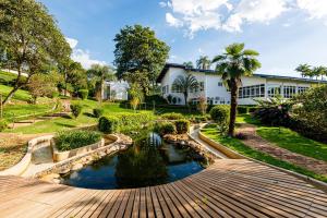 Κήπος έξω από το Hotel Fazenda Santanna