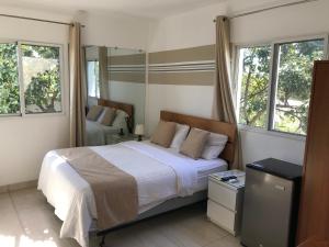 Postel nebo postele na pokoji v ubytování Centro de Santiago