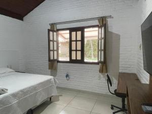 Postel nebo postele na pokoji v ubytování Hotel - Apart-hotel Chalé Executivo + 37 fotografií