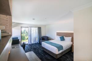 A bed or beds in a room at Invercauld House