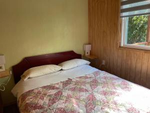 Postel nebo postele na pokoji v ubytování Cabaña container Ensenada