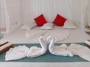 Letto o letti in una camera di Helios Beach Resort