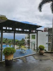 a pavilion with a picnic table on a patio at Cancel all reservation in Tagaytay