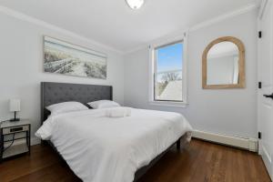 Ένα ή περισσότερα κρεβάτια σε δωμάτιο στο The Princeton Boston Luxurious Apartment - New! - Near Downtown Boston, Airport +11 φωτογραφίες