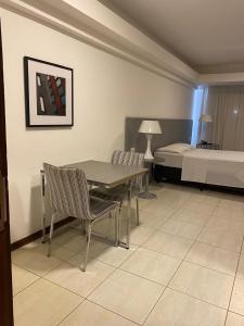 Postel nebo postele na pokoji v ubytování Loft 3 Edf Celita Franca Business e flat