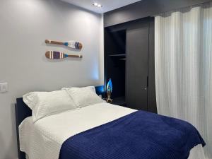 Postel nebo postele na pokoji v ubytování Flat Aconchegante em Muro Alto - Porto de Galinhas + 26 fotografií