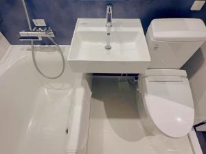 Koupelna v ubytování SAKURAKICHI Hotel