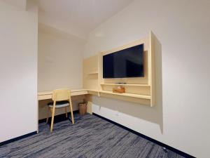 TV a/nebo společenská místnost v ubytování SAKURAKICHI Hotel