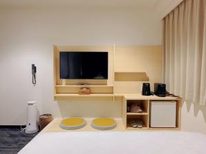 Postel nebo postele na pokoji v ubytování SAKURAKICHI Hotel + 20 fotografií