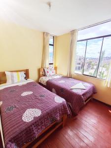 Ένα ή περισσότερα κρεβάτια σε δωμάτιο στο Apartamento Completo