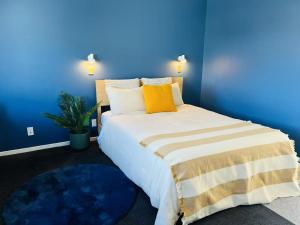 Postel nebo postele na pokoji v ubytování AAA Northlands Motel