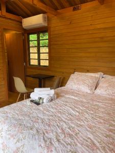 Postel nebo postele na pokoji v ubytování Chalé alievi