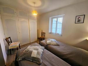 Ένα ή περισσότερα κρεβάτια σε δωμάτιο στο Gîte charmant près de la Loire avec WiFi et animaux admis - FR-1-381-503