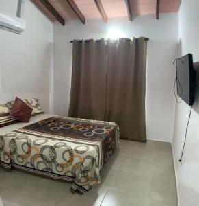 Postel nebo postele na pokoji v ubytování Palina Village Casa 12 - San Bernardino
