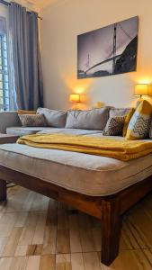 Giường trong phòng chung tại Apartment5 +15 ảnh