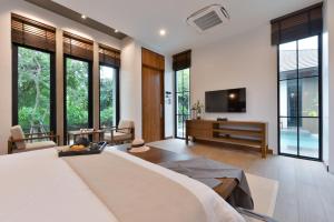 TV a/nebo společenská místnost v ubytování U ISARA PRIVATE VILLA Trang