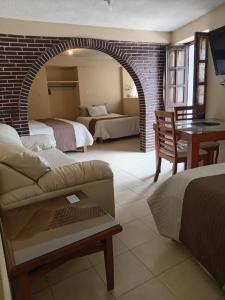Posezení v ubytování Hotel Real Cortés