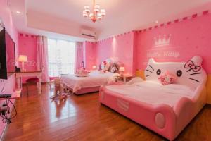 Postel nebo postele na pokoji v ubytování FRAGRANCE House Hanxi Changlong Panyu Wanda Plaza Store