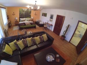 an overhead view of a living room with a couch at Hotel Atrium in Jihlava