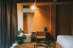 Posezení v ubytování Loji Nyanyi Suite Brew