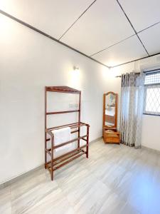 Postel nebo postele na pokoji v ubytování Dew Ceylon Villa
