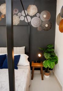 Ένα ή περισσότερα κρεβάτια σε δωμάτιο στο Boho Oasis 2 +3 φωτογραφίες