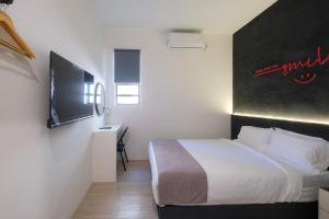 TV a/nebo společenská místnost v ubytování Loft 82 + 11 fotografií