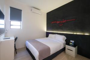 Postel nebo postele na pokoji v ubytování Loft 82