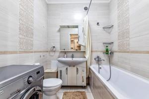 Koupelna v ubytování 1-но комнатные апартаменты в ЖК Promenade Expo