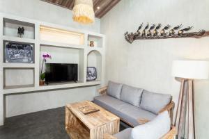 TV a/nebo společenská místnost v ubytování Uma Githa Ubud by Pramana Villas