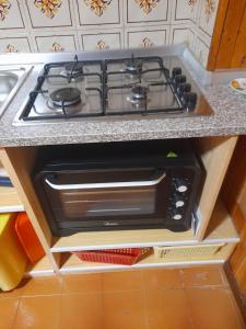 Kuchyň nebo kuchyňský kout v ubytování A casa di Olly