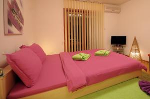 Krevet ili kreveti u jedinici u okviru objekta Apartments Iwa Centar