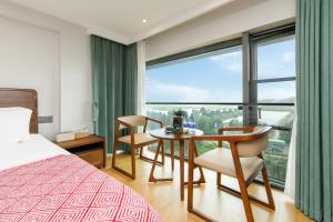 Foto da galeria de Zhujiajian Chunyu Qiushe Apartment em Zhujiajian Dao