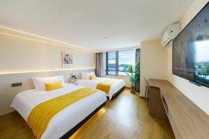 Foto da galeria de Zhujiajian Chunyu Qiushe Apartment em Zhujiajian Dao