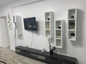 TV a/nebo společenská místnost v ubytování Fabri's Studio