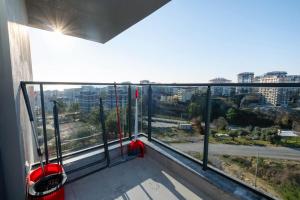 a balcony with a view of a city at Seda Holiday in Alanya